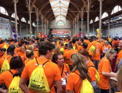Packed hall full of people dressed in orange t-shirts at the Techies4TempleStreet event in the RDS; PR, digital marketing, social media marketing, social media, Irish tech sector, Public Relations, content marketing