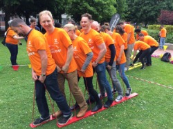 The Comit team on a set of six-person red skiis in a park; PR, digital marketing, social media marketing, social media, Irish tech sector, Public Relations, content marketing