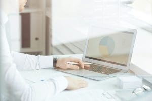 Project manager analyzing survey on social needs