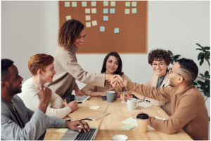A group of people in a meeting room